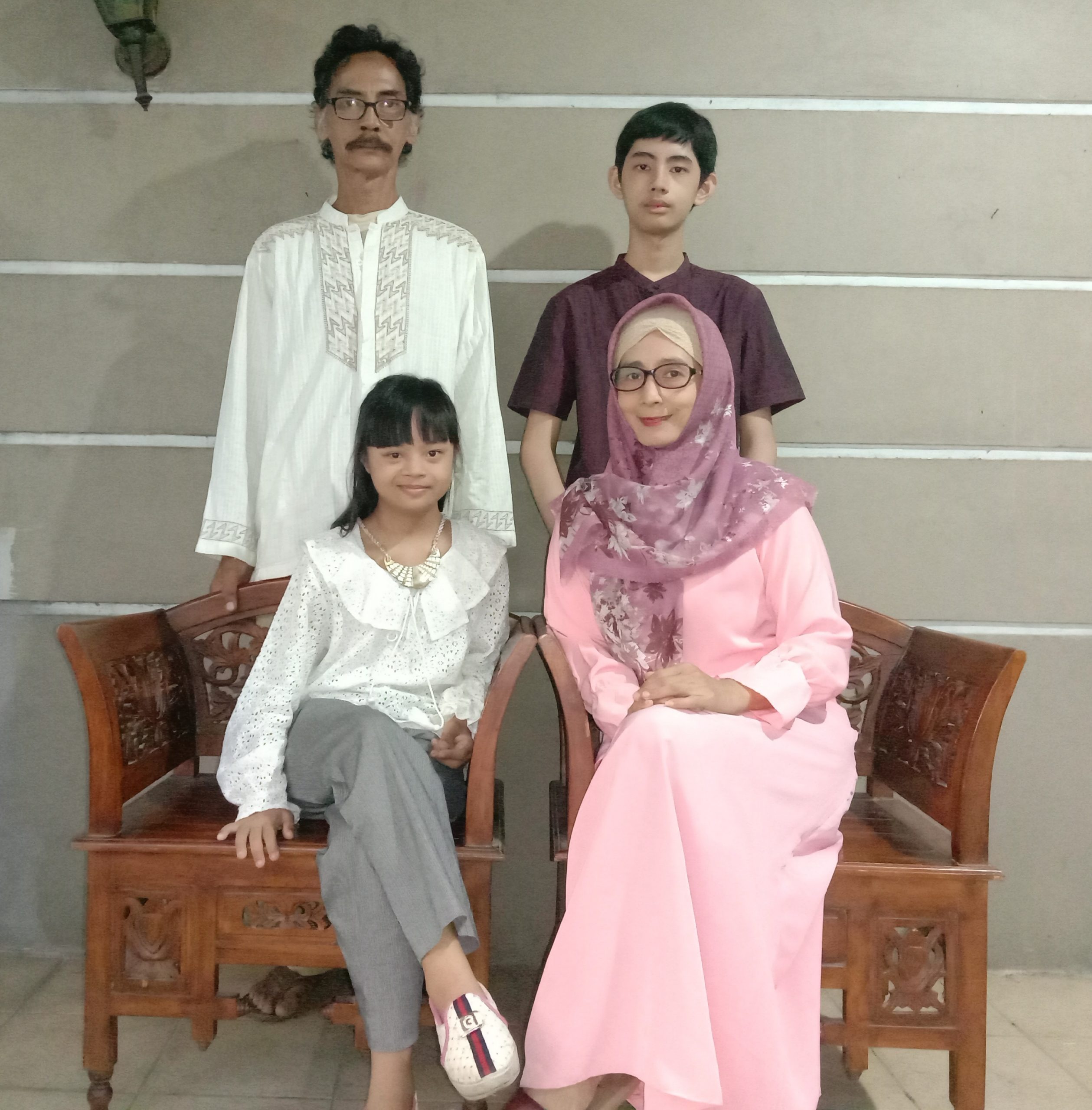 Rei with her family